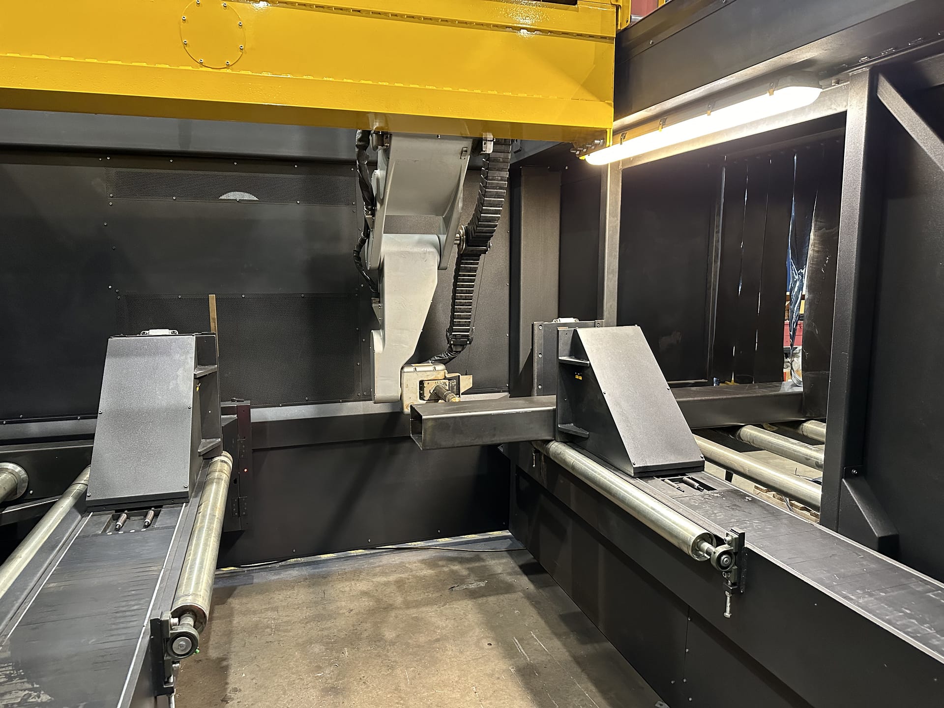 Inside the Metaltek XB1200 showing the material handling and cutting area