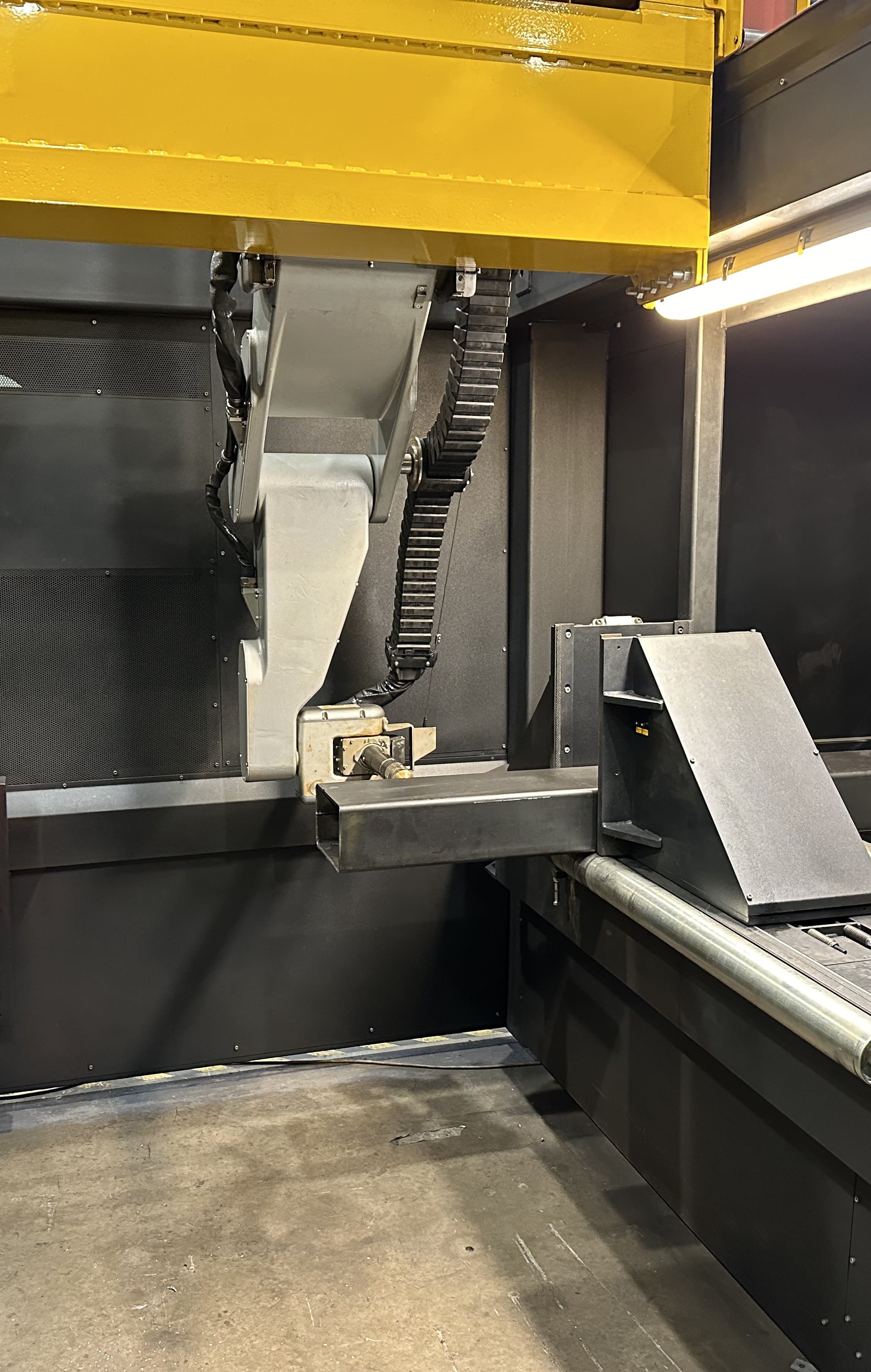 Inside the Metaltek XB1200 showing the material handling and cutting area